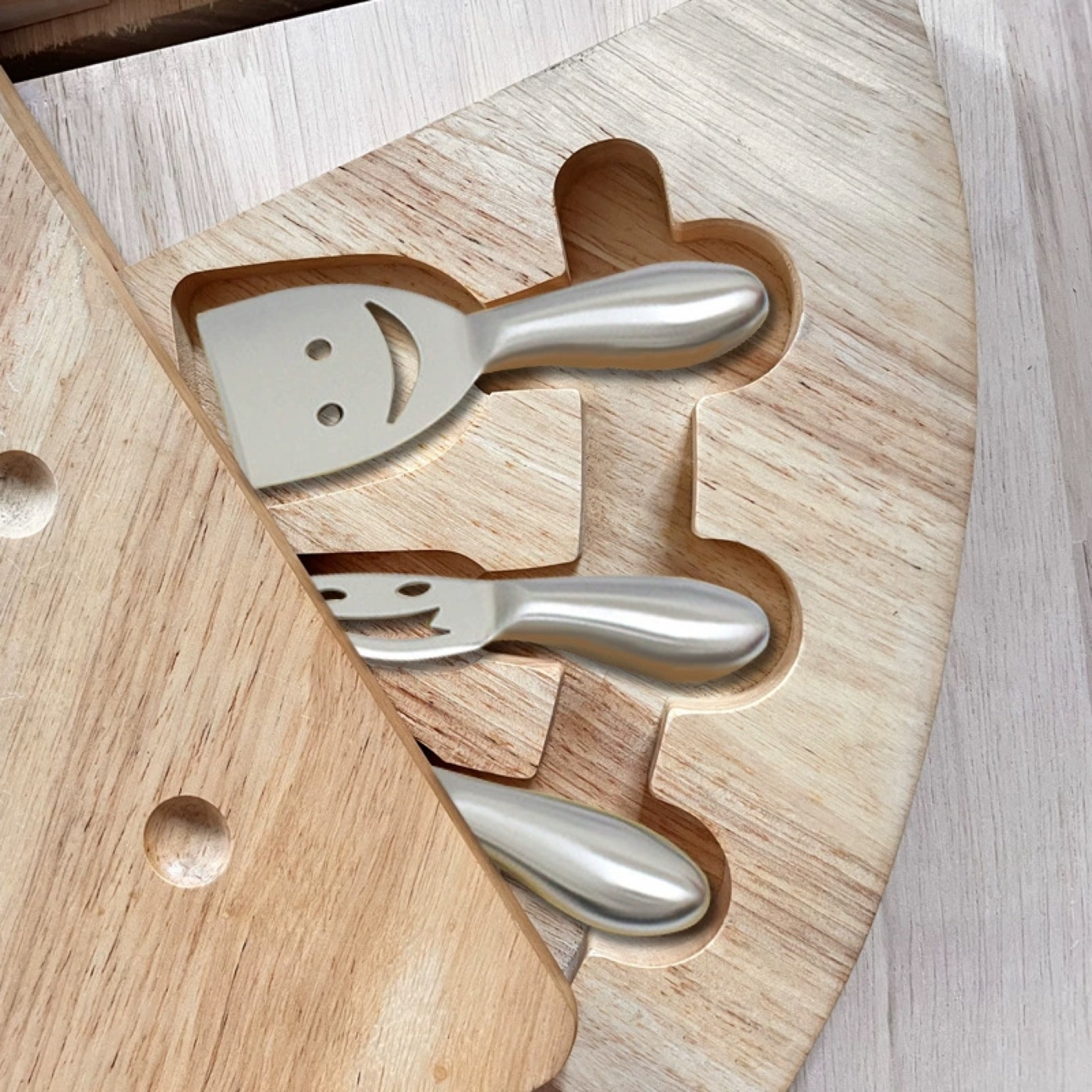 Cheese board with knives